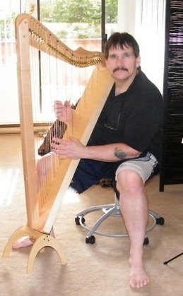 <p>learning the harp in 2010 at my studio in False Creek</p>