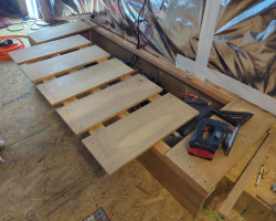 My landlord was throwing out a big bookshelf made of high quality plywood so I took it apart and made it into this couch that hides all the electronics for the solar power system and the batteries.
