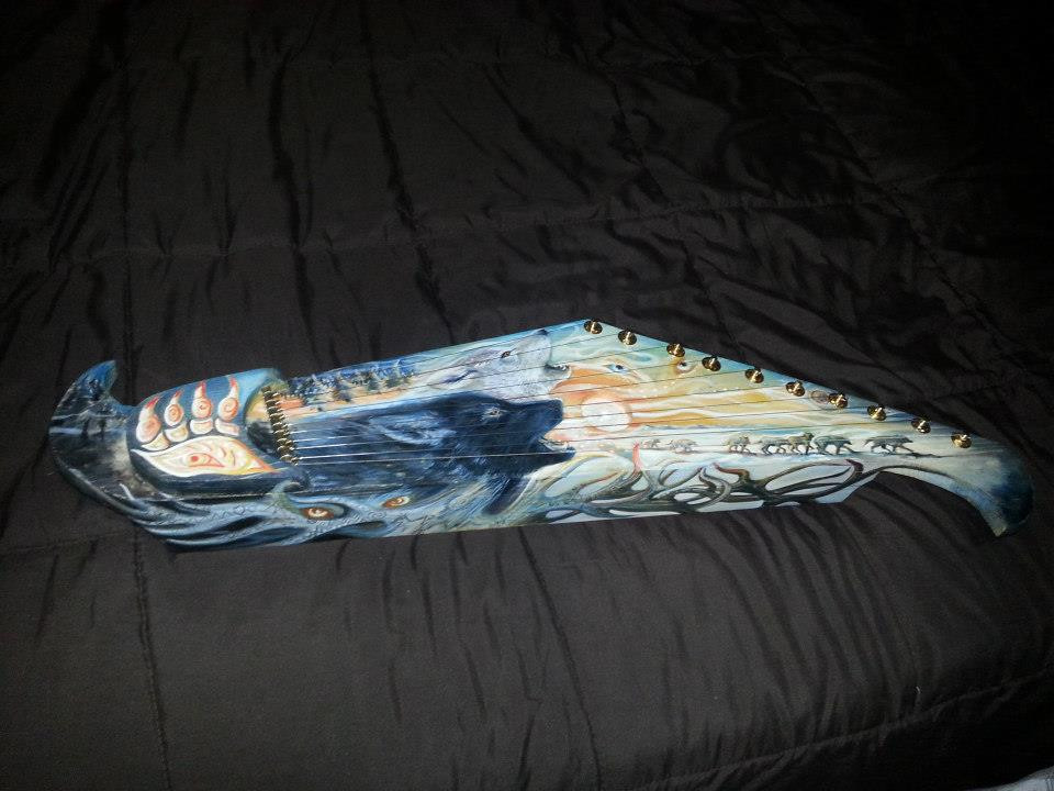 <p>hand made harp created by a friend as a gift for me,,, years later it would be stolen out of storage locker and lost out in the world</p>
